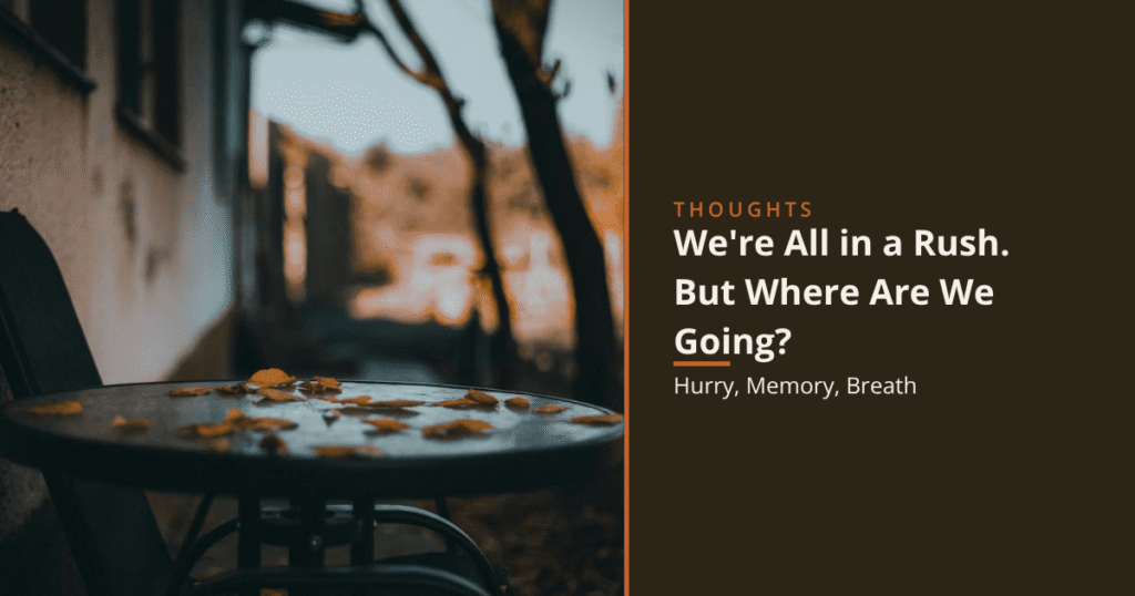 Round outdoor table scattered with autumn leaves and an empty chair, warm sunset light, overlaid with the article title "We're All in a Rush. But Where Are We Going?"